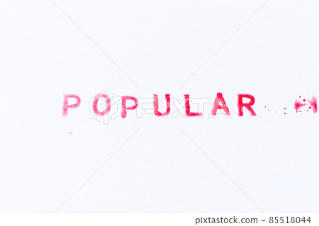Red color ink rubber stamp in word popular on white paper background Red color ink rubber stamp in word popular on white paper background 85518044