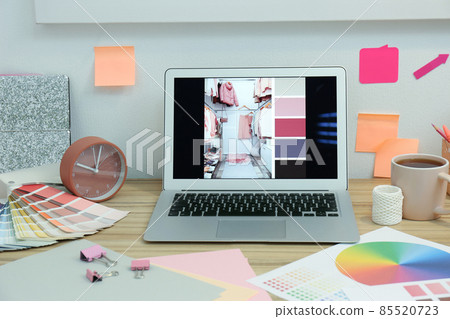Designer's workplace with modern laptop and color palettes Designer's workplace with modern laptop and color palettes 85520723