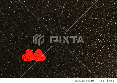 Two Red Hearts On a shiny black Textured Background Two Red Hearts On a shiny black Textured Background 85521255
