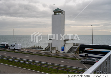 The Afsluitdijk is a major dam and causeway in the Netherlands. It is a fundamental part of the larger Zuiderzee Works, damming off salt water of the North Sea, and turning it into a fresh water lake The Afsluitdijk is a major dam and causeway in the Netherlands. It is a fundamental part of the larger Zuiderzee Works, damming off salt water of the North Sea, and turning it into a fresh water lake 85521375