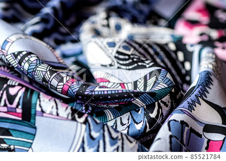 draped colorful blue fabric with geometric print draped colorful blue fabric with geometric print 85521784