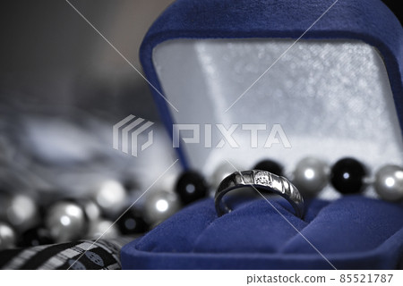Diamond engagement ring in open blue gift box Diamond engagement ring in open blue gift box 85521787