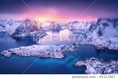 Aerial view of beautiful snowy islands, village, sea, mountains 85521867