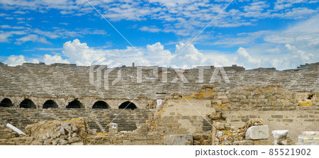 Ruins of an antique amphitheater.Vacation and travel concept. Wide photo. Ruins of an antique amphitheater.Vacation and travel concept. Wide photo. 85521902