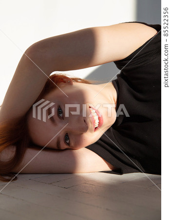 Young white european woman on the floor 85522356