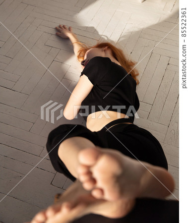 Young white european woman on the floor Young white european woman on the floor 85522361