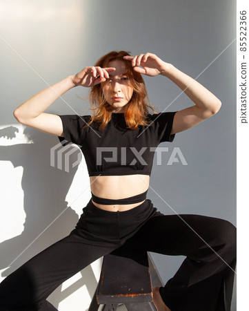 Young white european woman background in shadows Young white european woman background in shadows 85522366
