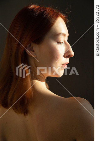 Young white european woman isolated on black Young white european woman isolated on black 85522372