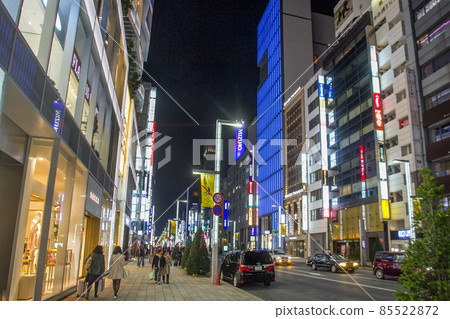 03-22-2015 Tokyo, Japan.  Cars and people at night  on Chuo-dori ave, Ginza district 85522872