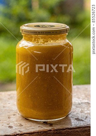 Itaja, Goias, Brazil - 12 24 2021: Pequi preserve glass 85526723