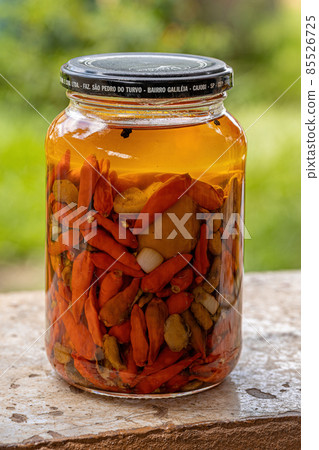 Itaja, Goias, Brazil - 12 24 2021: Jar of chili pepper preserves 85526725