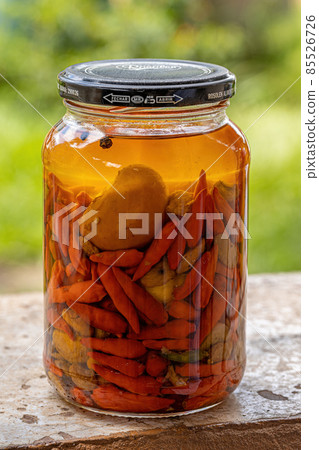 Itaja, Goias, Brazil - 12 24 2021: Jar of chili pepper preserves 85526726