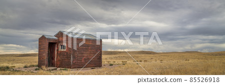 old, metal, rusty shack on a prairie old, metal, rusty shack on a prairie 85526918