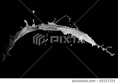 White paint splash isolated on black background. 85527314