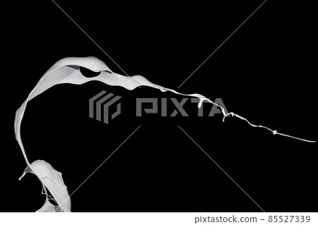 White paint splash isolated on black background. 85527339