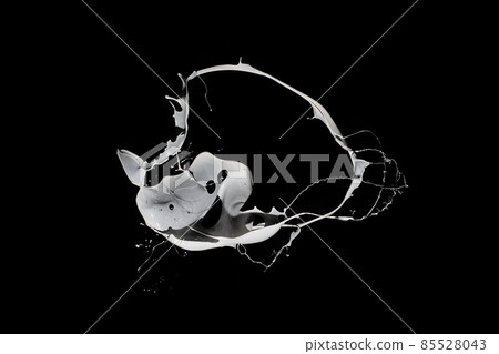 White paint splash isolated on black background. 85528043