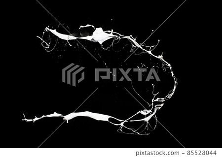 White paint splash isolated on black background. 85528044