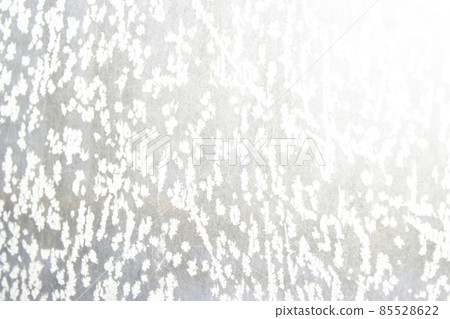 the light comes through a frozen winter window on a frosty day. abstraction background the light comes through a frozen winter window on a frosty day. abstraction background 85528622