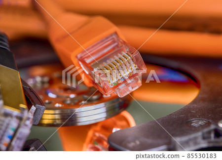 Selective focus at internet network cables connected with online storage files backup 85530183