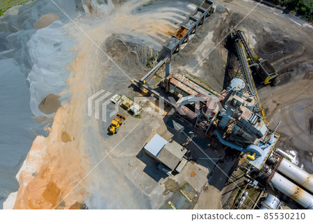 Asphalt production factory an industrial production plant surrounded by piles of gravel 85530210