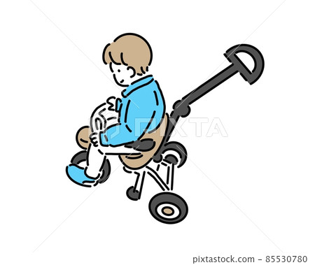 A child riding a tricycle with a handle 85530780