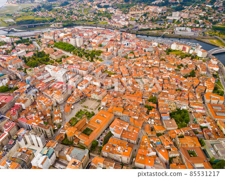 Panoramic view from drone on the city center Pontevedra with embankment of the river Rio Lerez. Galicia. Panoramic view from drone on the city center Pontevedra with embankment of the river Rio Lerez. Galicia. 85531217