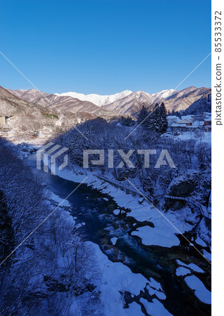 Tanigawadake illuminated by the morning sun Tanigawadake illuminated by the morning sun 85533372