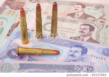 Currency From Iraq With Three Bullets, Close up 85537003