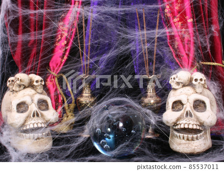Skull and Crystal Ball on Black Background Spooky Scene 85537011