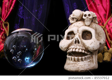 Skull and Crystal Ball on Black Background Spooky Scene Skull and Crystal Ball on Black Background Spooky Scene 85537012