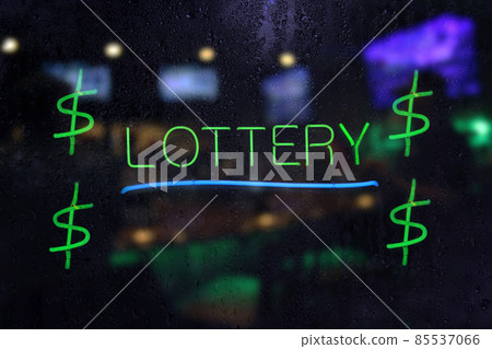 Neon Lottery Sign in Wet Rainy Window Neon Lottery Sign in Wet Rainy Window 85537066