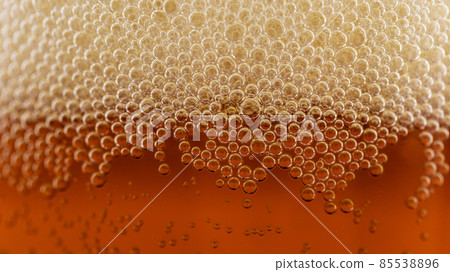 beer foam in a glass, macro photography, soft focus 85538896