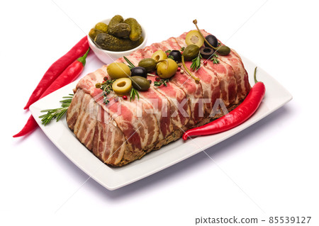 Traditional French terrine covered with bacon isolated on white background 85539127