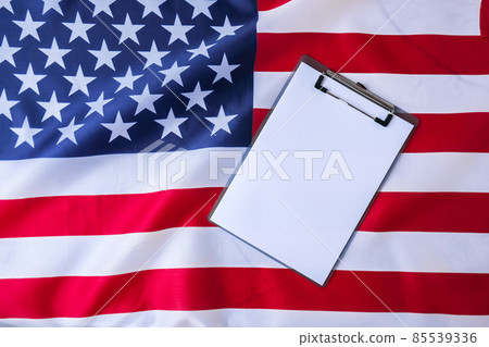 American flag with empty paper note copy space. Flag of the united states of America. July 4th Independence Day. USA patriotism national holiday. Usa proud. American flag with empty paper note copy space. Flag of the united states of America. July 4th Independence Day. USA patriotism national holiday. Usa proud. 85539336