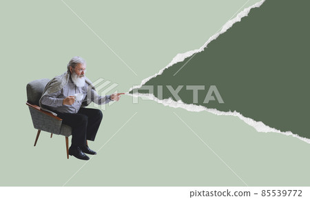 Senior man wearing retro style clothes sitting in armchair isolated on torn paper background. Contemporary art collage. Minimalism Senior man wearing retro style clothes sitting in armchair isolated on torn paper background. Contemporary art collage. Minimalism 85539772