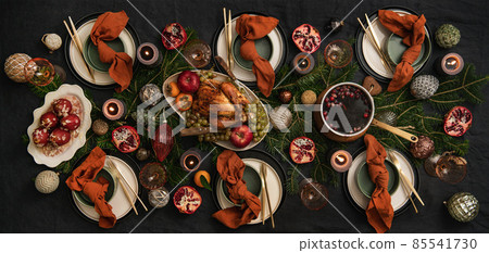 Christmas holiday dinner festive table setting Christmas holiday dinner festive table setting 85541730