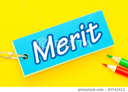 A word card with the words "Merit" written on it. Benefits, benefits, strengths A word card with the words "Merit" written on it. Benefits, benefits, strengths 85542412
