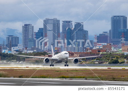 JAL A350, a passenger plane taking off from Osaka Airport 85543171