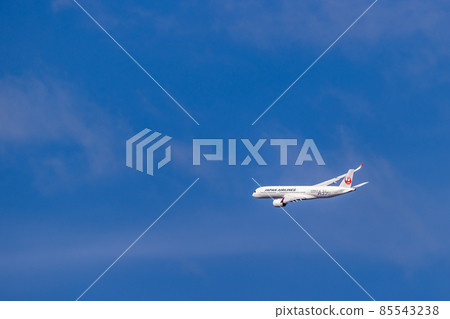 JAL A350, a passenger plane that continues to rise after taking off from Osaka Airport 85543238