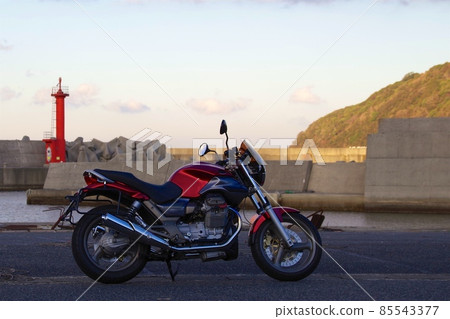 Touring at MOTOGUZZI at a fishing port 85543377