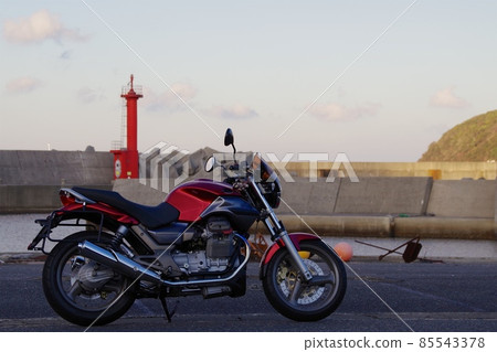 Touring at MOTOGUZZI at a fishing port 85543378