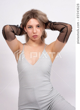 Young white european woman on grey 85543628