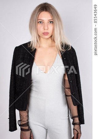 Young white european woman on grey 85543649
