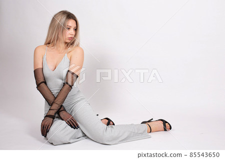 Young white european woman on grey Young white european woman on grey 85543650