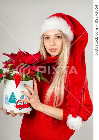 Young white european woman on grey Young white european woman on grey 85543654
