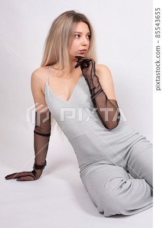 Young white european woman on grey Young white european woman on grey 85543655