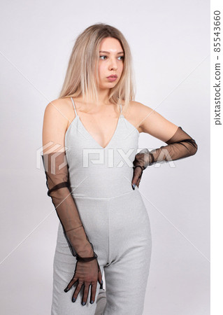 Young white european woman on grey Young white european woman on grey 85543660