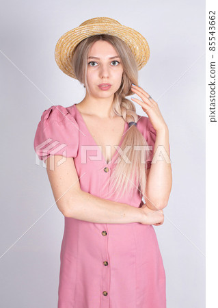 Young white european woman on grey Young white european woman on grey 85543662