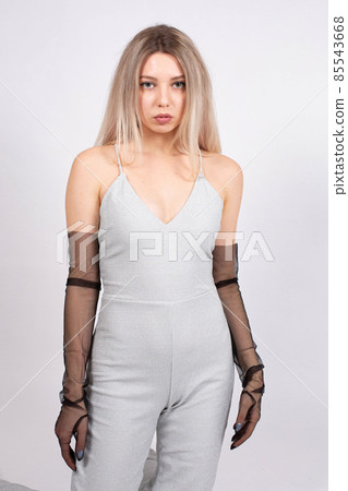 Young white european woman on grey Young white european woman on grey 85543668