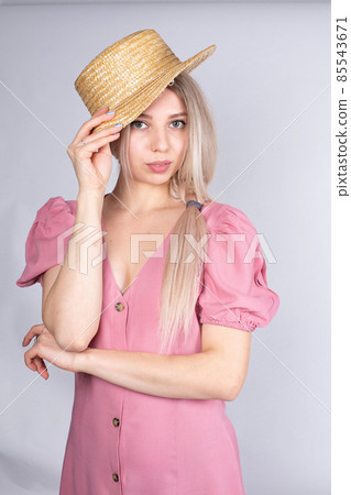 Young white european woman on grey Young white european woman on grey 85543671